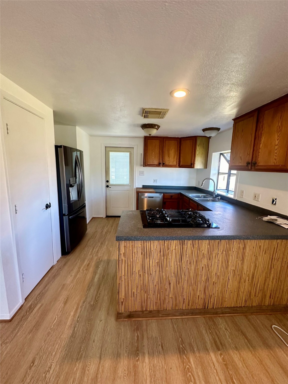 124 7th Street Dickinson, TX 77539 - Photo 2 of 19 a living room with a bed and furniture