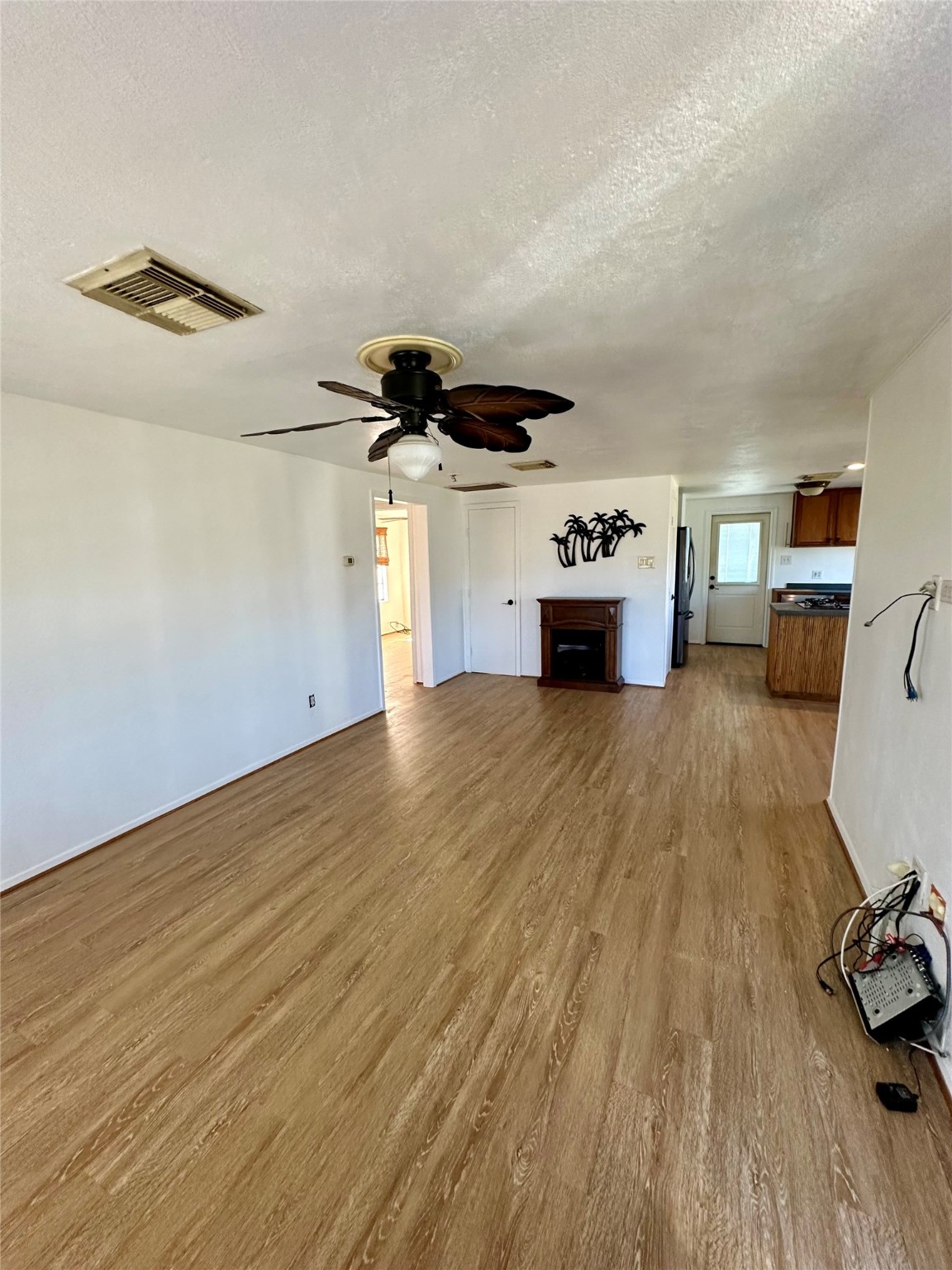 124 7th Street Dickinson, TX 77539 - Photo 7 of 19 a view of a livingroom with furniture and a ceiling fan