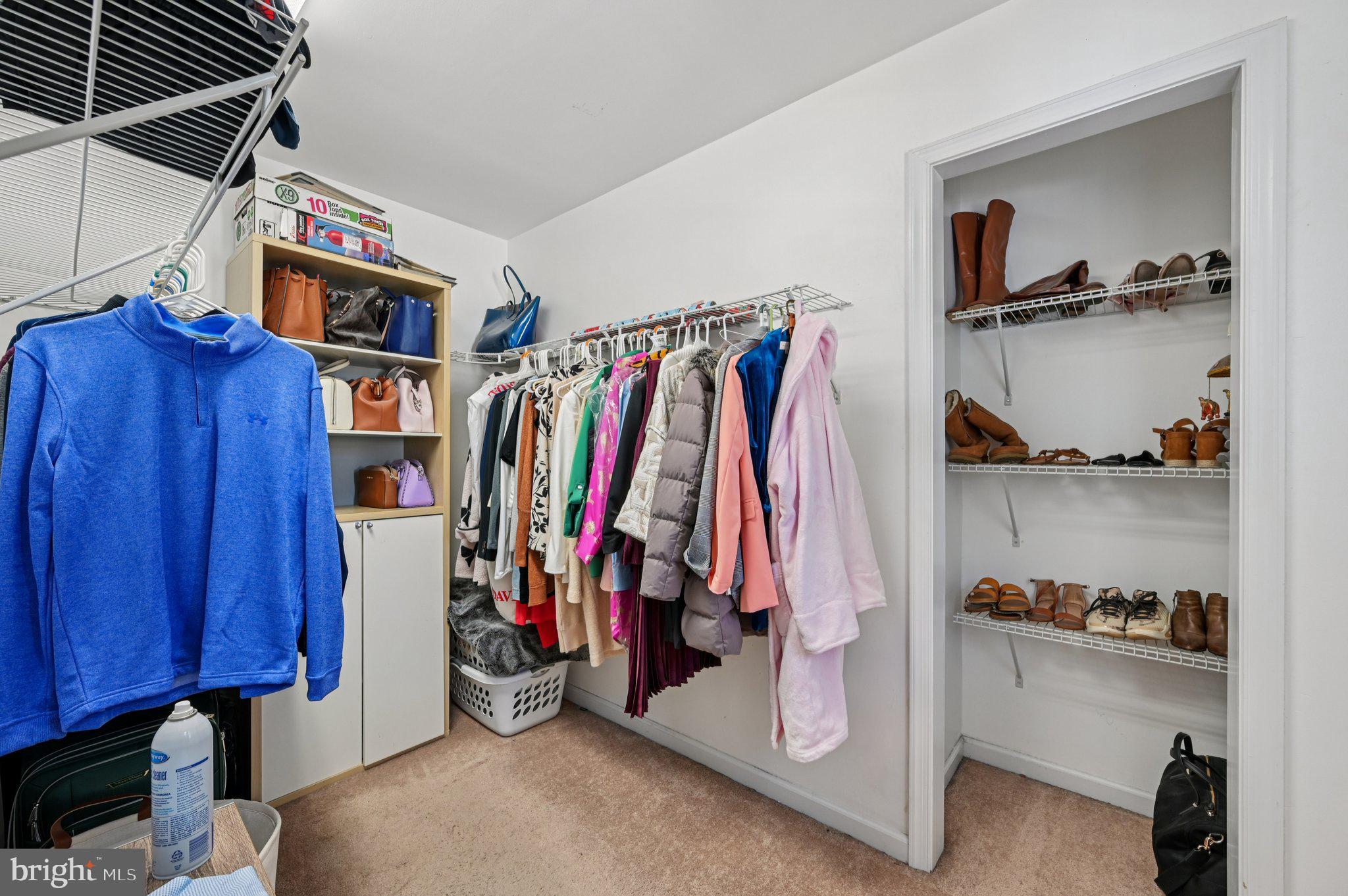 3025 Rock Drive Riva, MD 21140 - Photo 22 of 48 a view of walk in closet with clothes and shoes