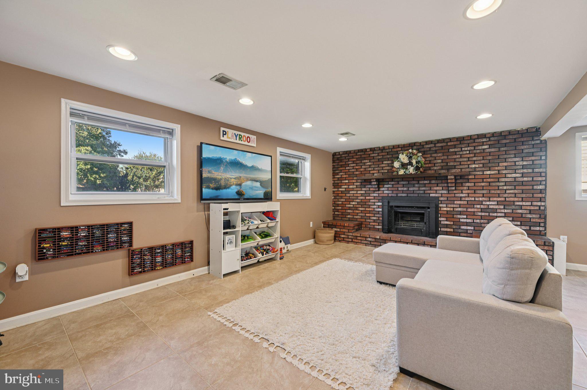 3025 Rock Drive Riva, MD 21140 - Photo 31 of 48 a living room with furniture and a fireplace