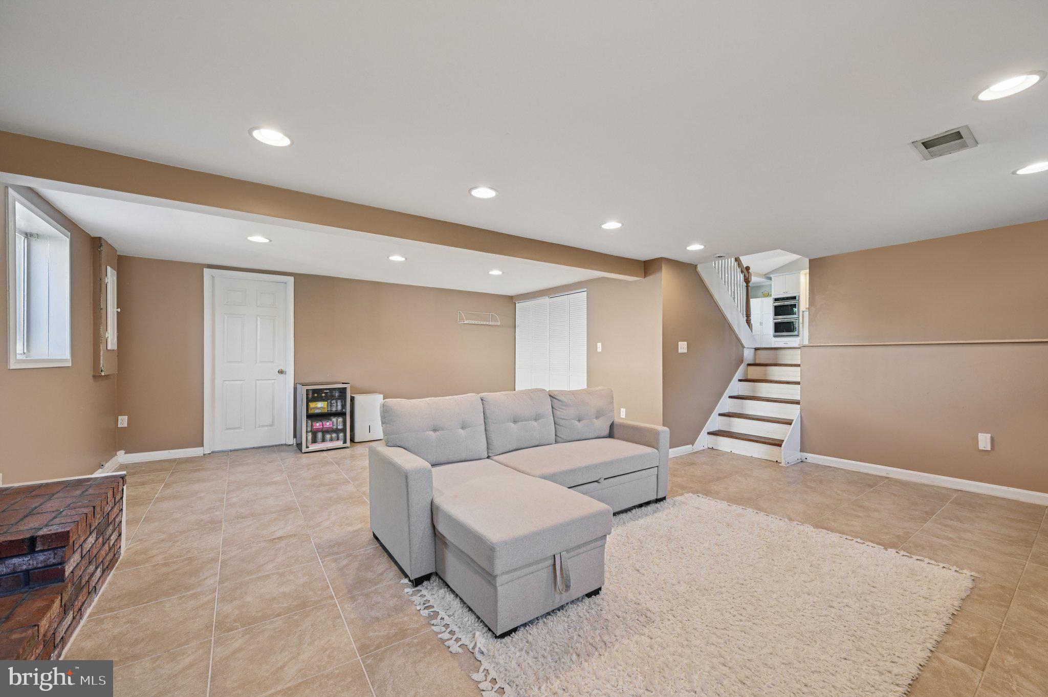 3025 Rock Drive Riva, MD 21140 - Photo 33 of 48 a living room with furniture and a rug