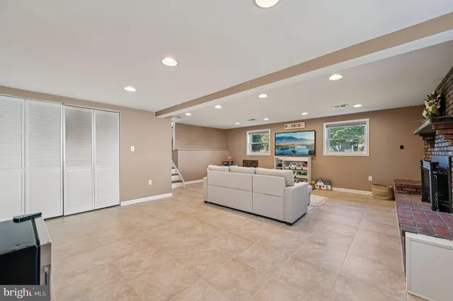 a living room with furniture and a table