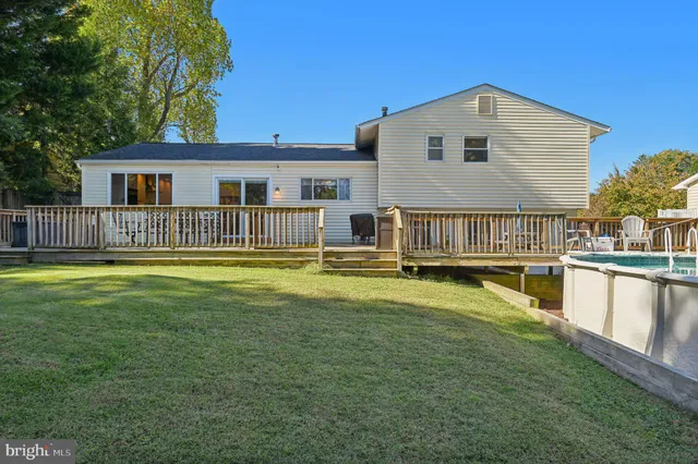 a front view of a house with swimming pool