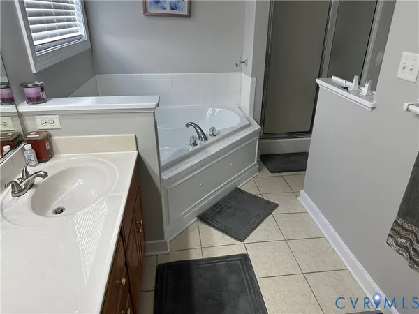 a bathroom with a sink toilet and tub