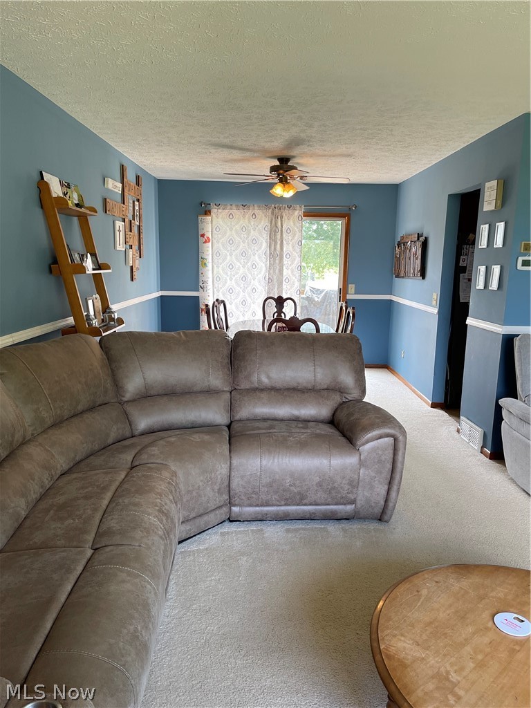 42895 Telegraph Road Elyria, OH 44035 - Photo 10 of 35 Living room looking into dining room