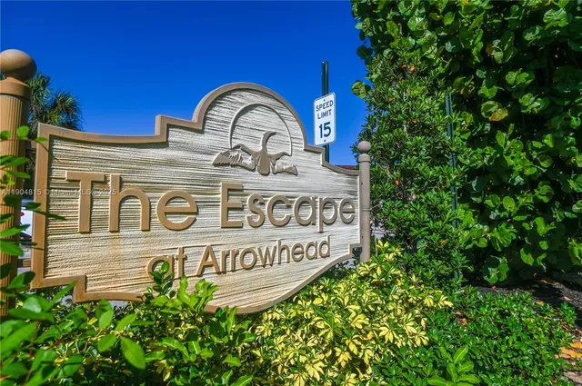 a view of swimming pool with chairs