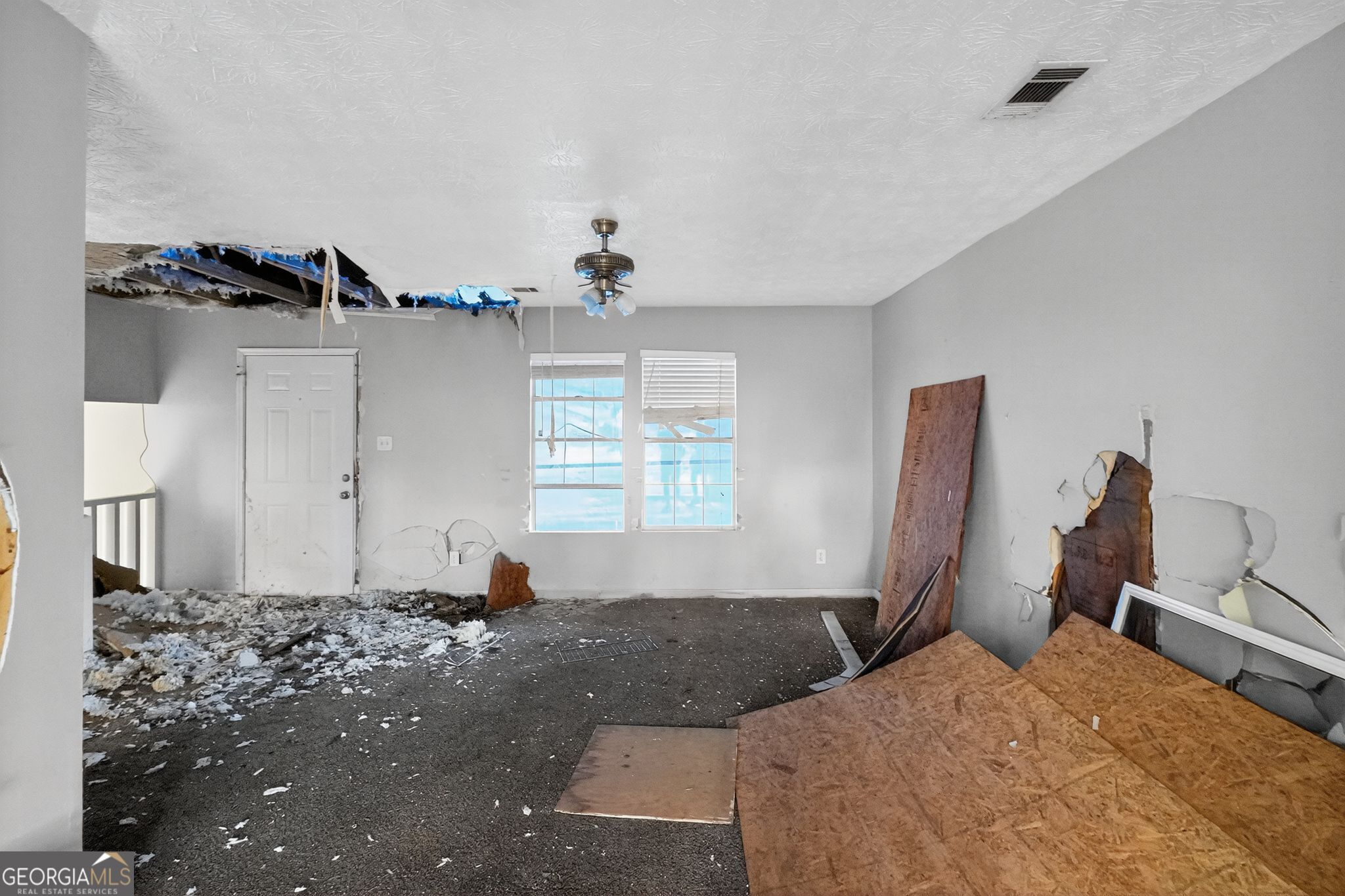 3840 Rolling Place Conley, GA 30288 - Photo 15 of 35 a bedroom with a bed and window