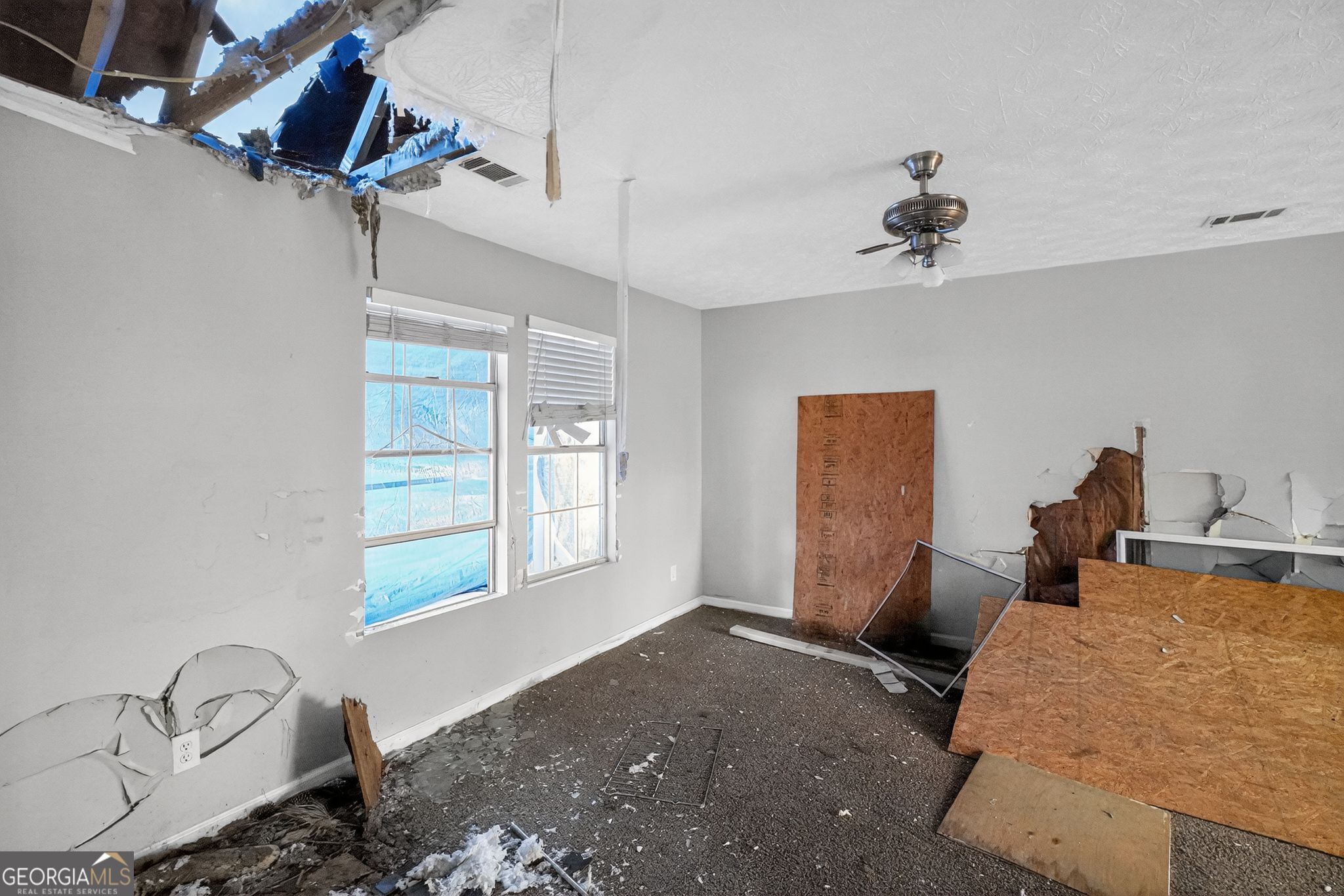 3840 Rolling Place Conley, GA 30288 - Photo 20 of 35 a bedroom with furniture and window