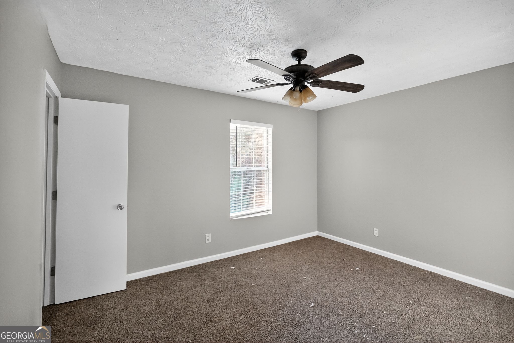 3840 Rolling Place Conley, GA 30288 - Photo 31 of 35 a view of an empty room with a window
