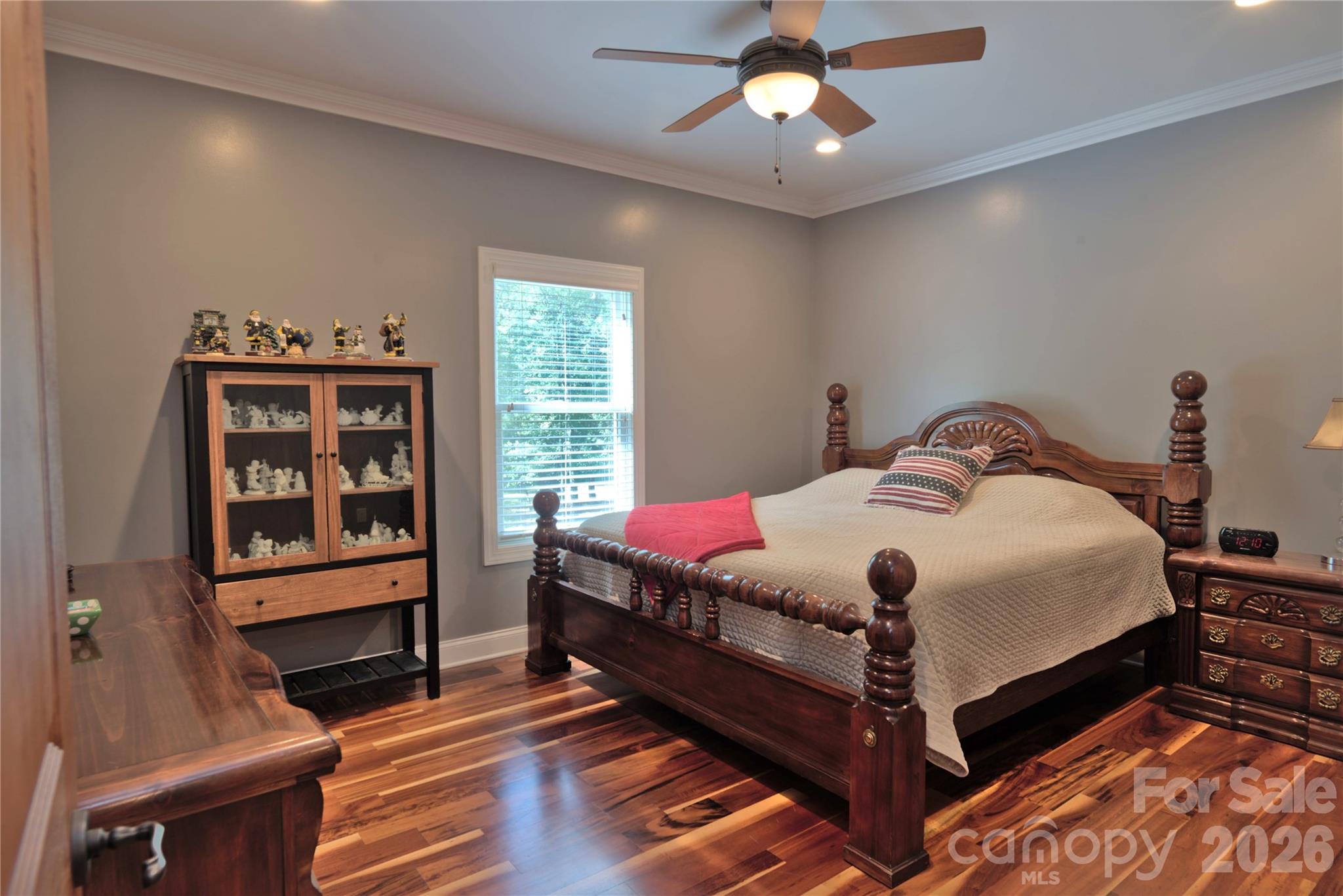 15027 Beatties Ford Road Huntersville, NC 28078 - Photo 24 of 33 a bedroom with a bed and a window
