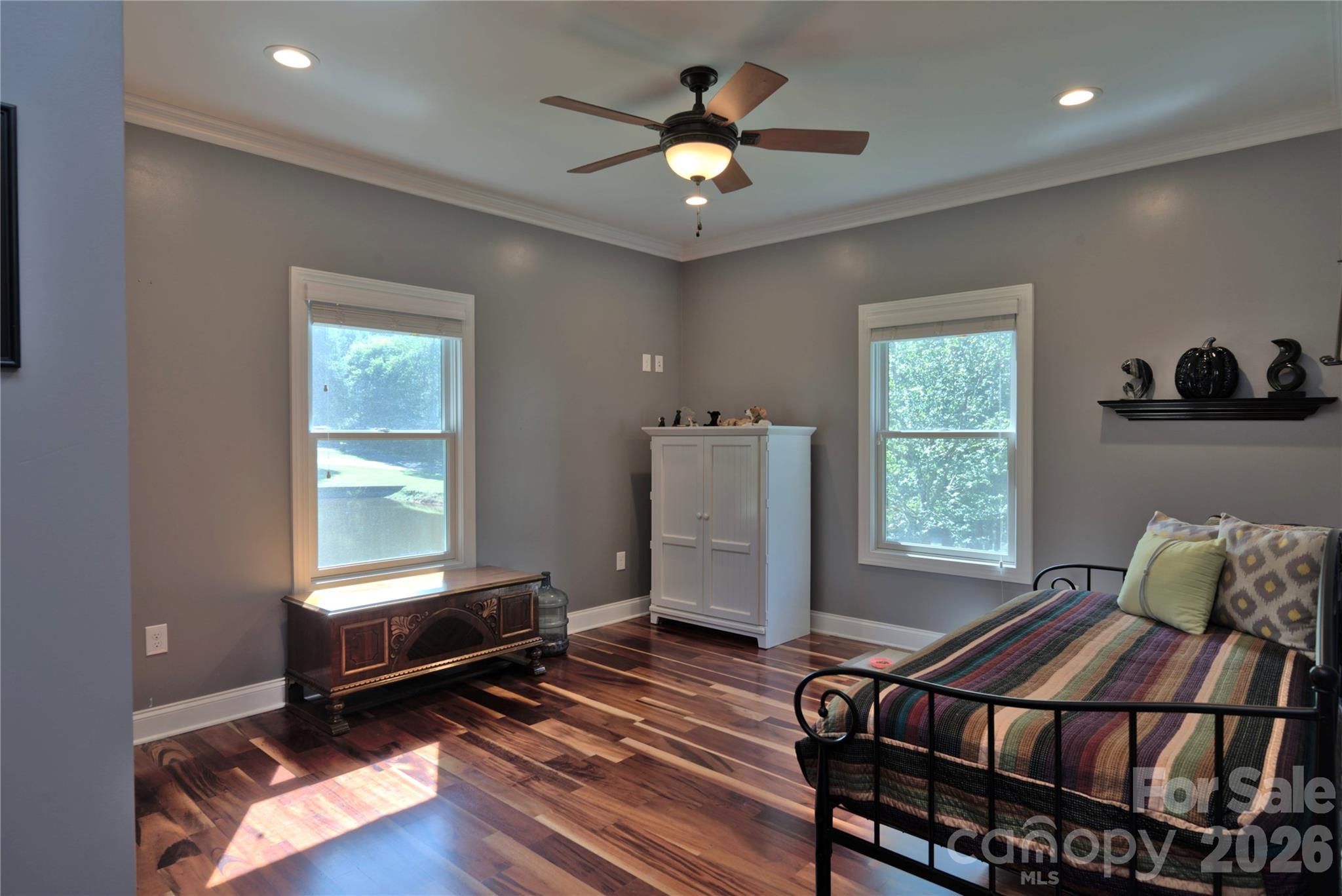 15027 Beatties Ford Road Huntersville, NC 28078 - Photo 25 of 33 a living room with furniture and a window