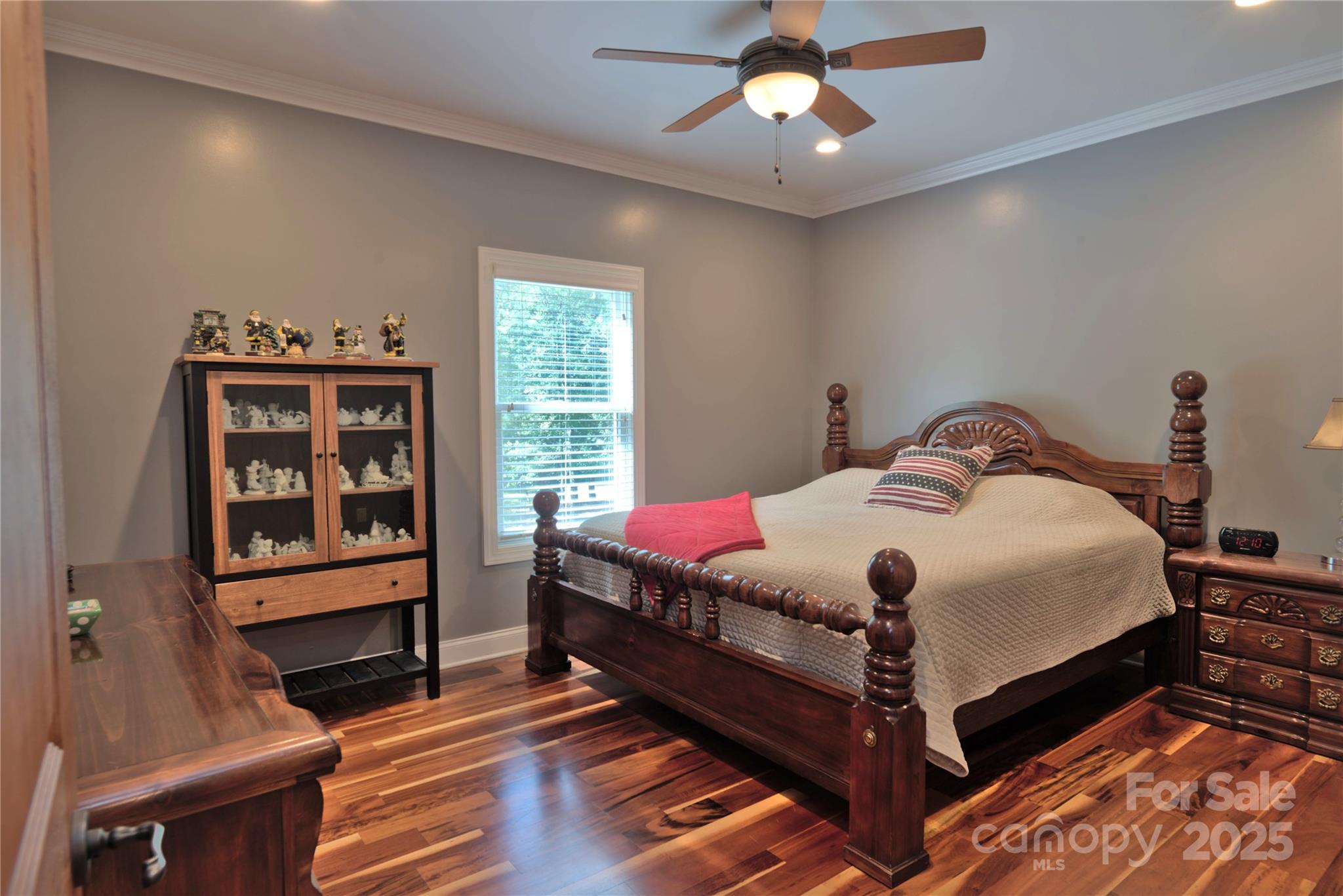 15027 Beatties Ford Road Huntersville, NC 28078 - Photo 27 of 34 a bedroom with a bed and a window