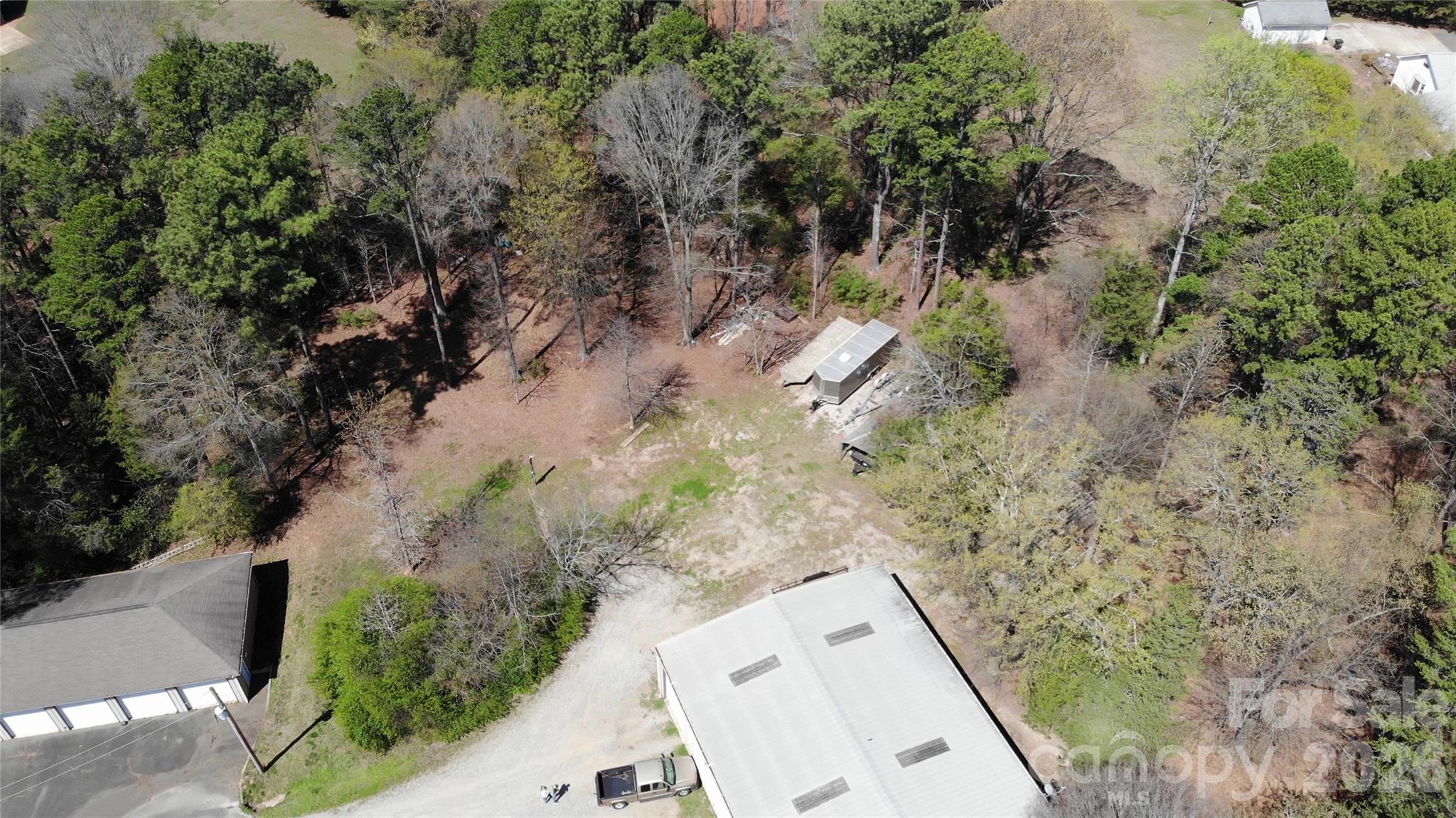 15027 Beatties Ford Road Huntersville, NC 28078 - Photo 33 of 33 an aerial view of a house with a yard