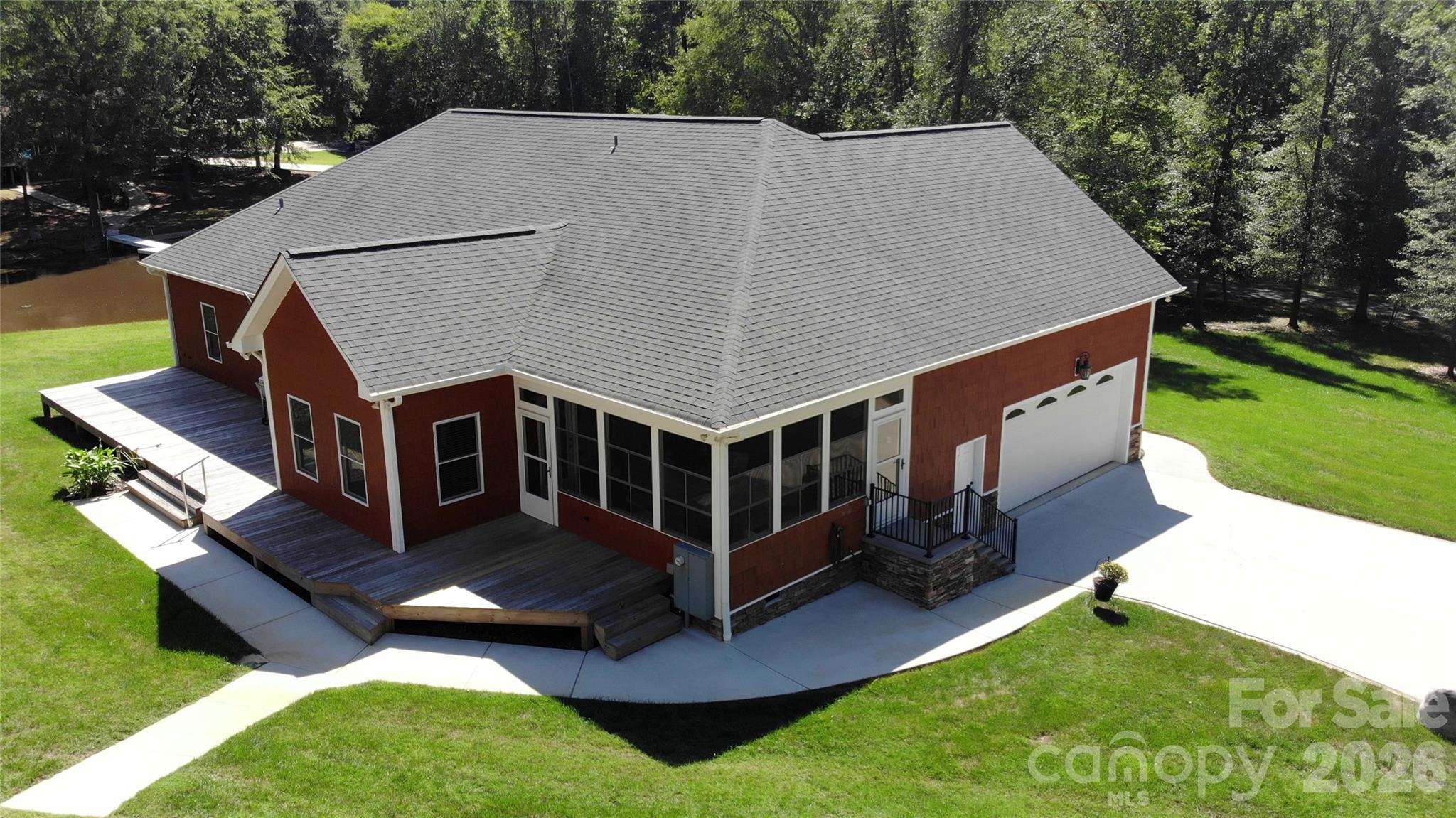 15027 Beatties Ford Road Huntersville, NC 28078 - Photo 6 of 33 a aerial view of a house with a yard