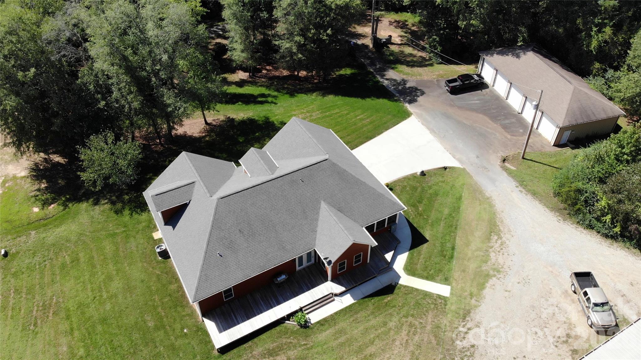 15027 Beatties Ford Road Huntersville, NC 28078 - Photo 9 of 33 an aerial view of a house