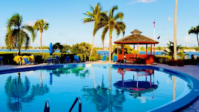 a view of outdoor space with swimming pool and lounge chair