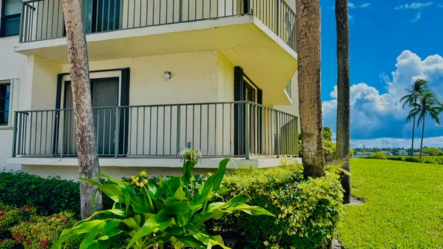 a bathroom with a double vanity sink mirror and shower