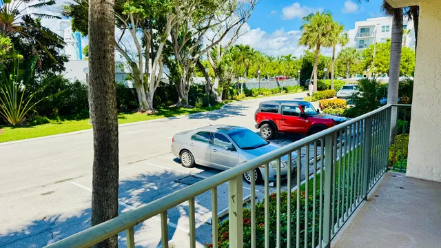 a kitchen with a stove a sink and a microwave