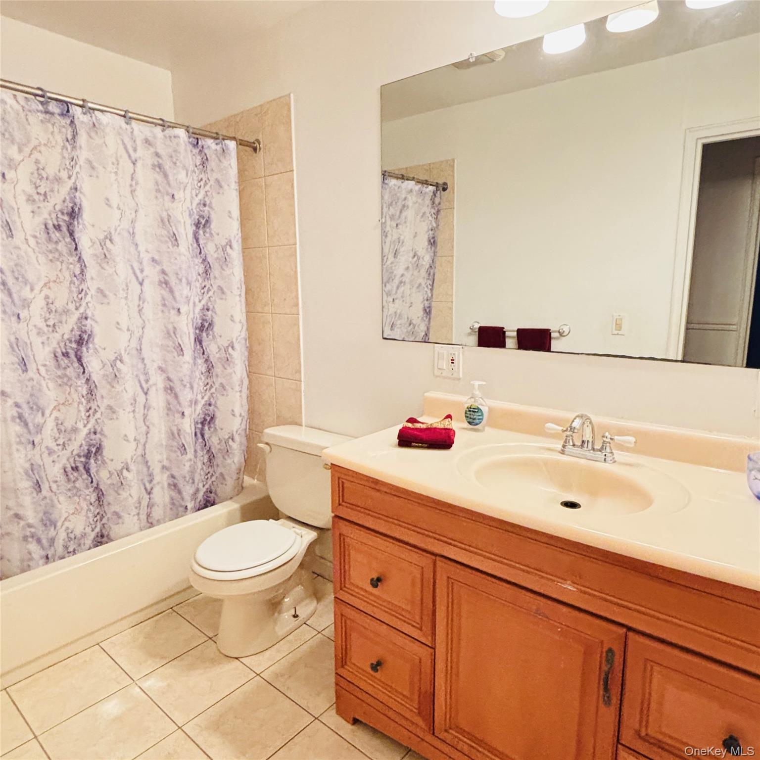 929 Fox Meadow Road Yorktown Heights, NY 10598 - Photo 11 of 39 Bedroom level Bathroom featuring vanity, shower / tub combo