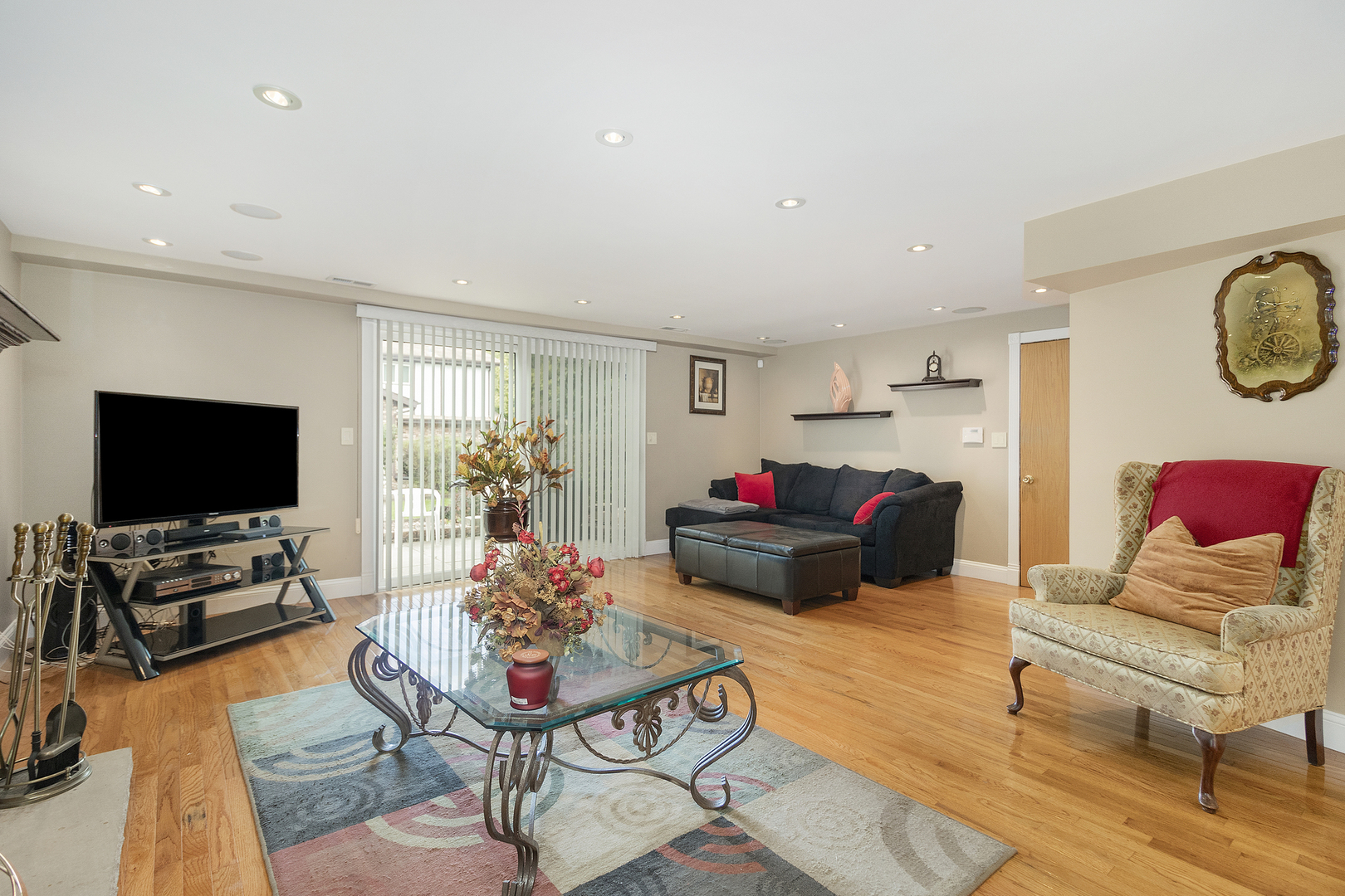 1319 Elder Road Homewood, IL 60430 - Photo 18 of 24 a living room with furniture and a flat screen tv