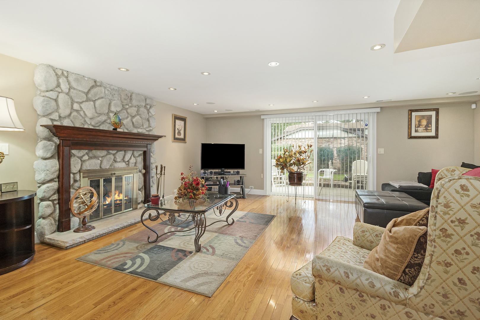 1319 Elder Road Homewood, IL 60430 - Photo 19 of 24 a living room with furniture and a flat screen tv