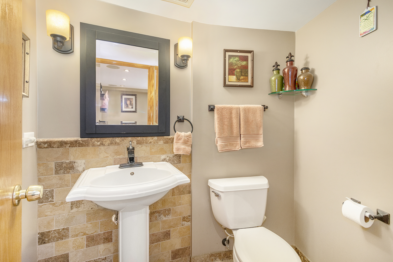 1319 Elder Road Homewood, IL 60430 - Photo 20 of 24 a bathroom with a toilet sink and mirror
