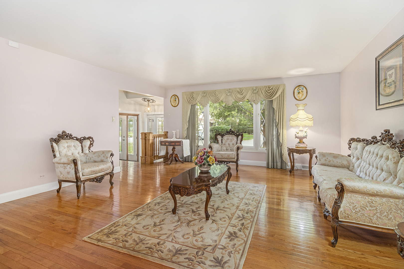 1319 Elder Road Homewood, IL 60430 - Photo 4 of 24 a living room with furniture and a rug