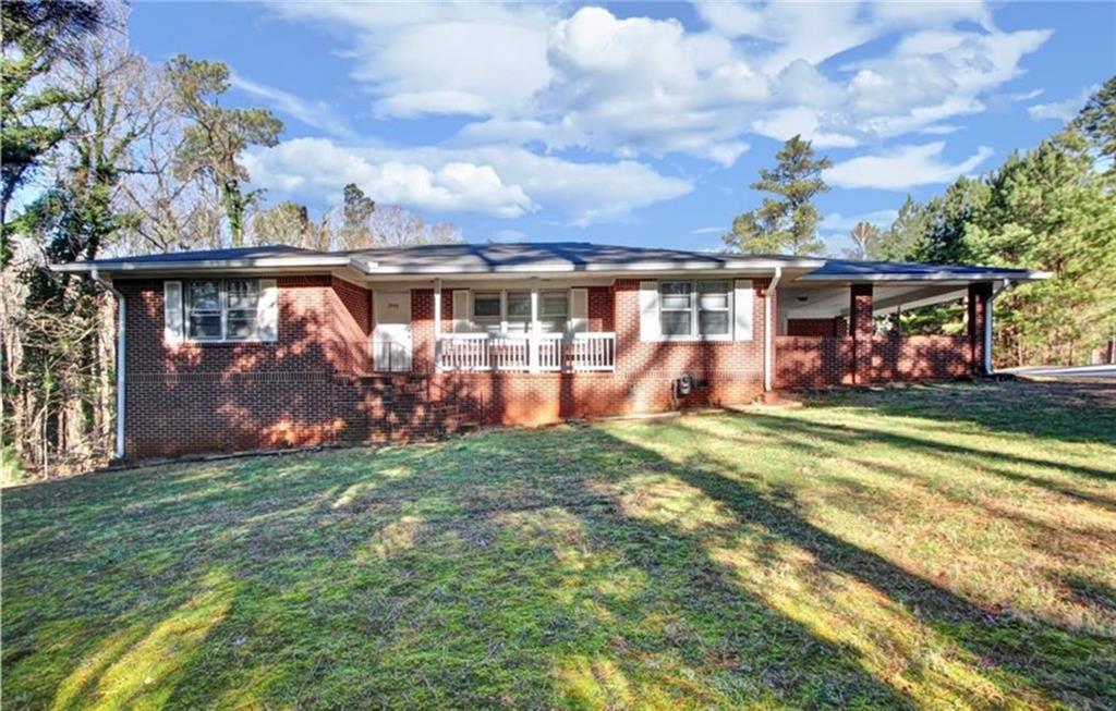 front view of a house with a big yard