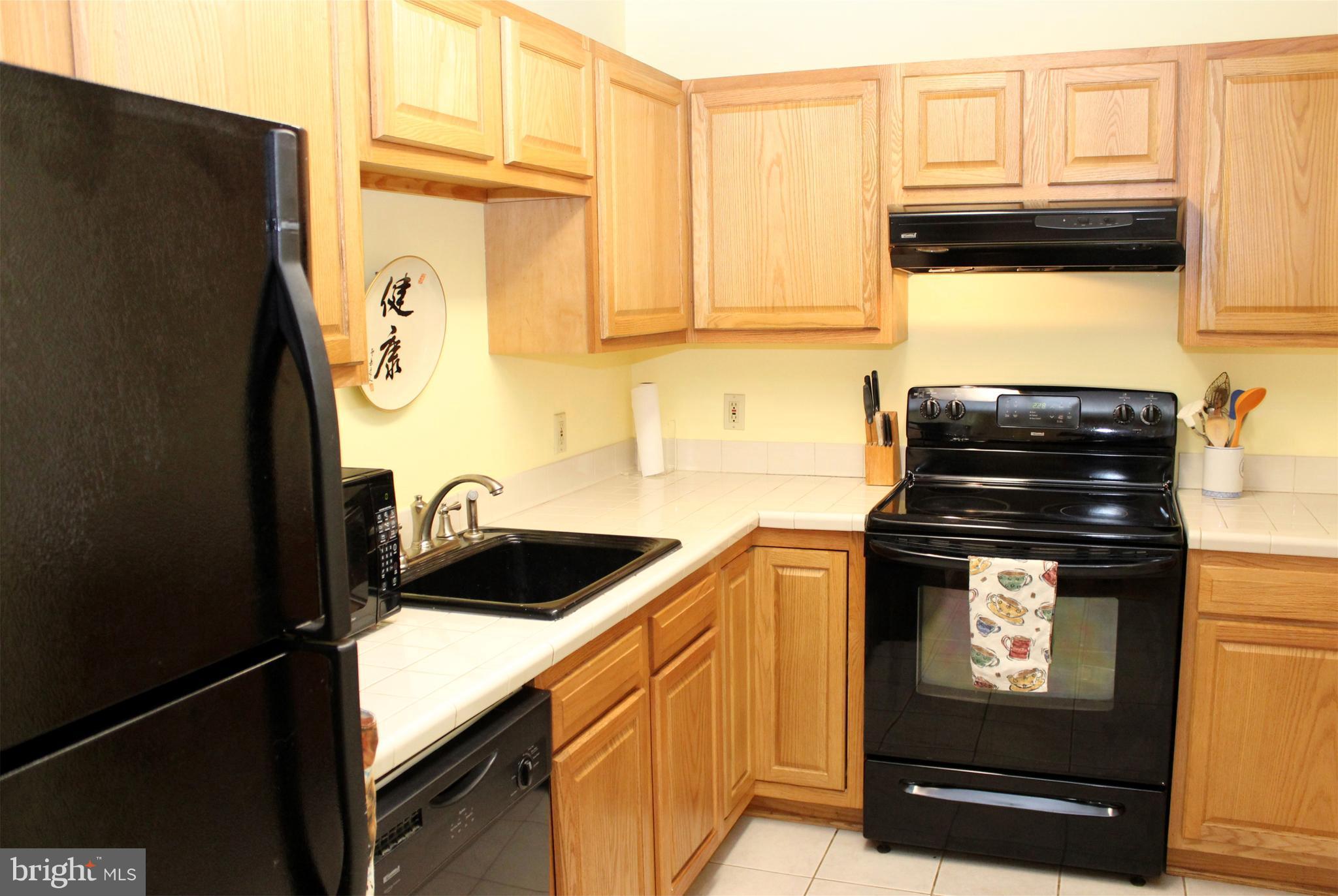 10311 River Road Rixeyville, VA 22737 - Photo 15 of 30 a kitchen with a stove and a microwave