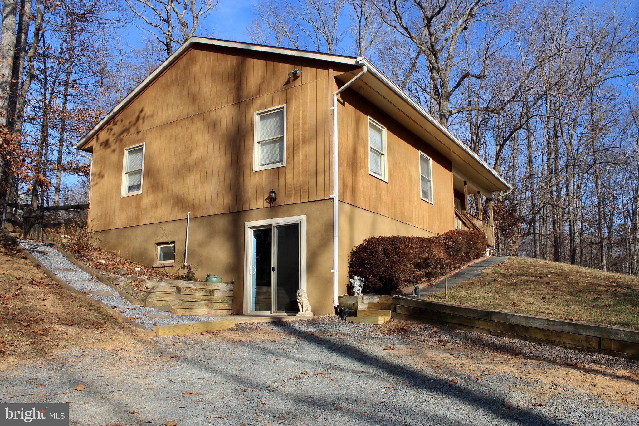 10311 River Road Rixeyville, VA 22737 - Photo 3 of 30 a view of a house with a snow on the road