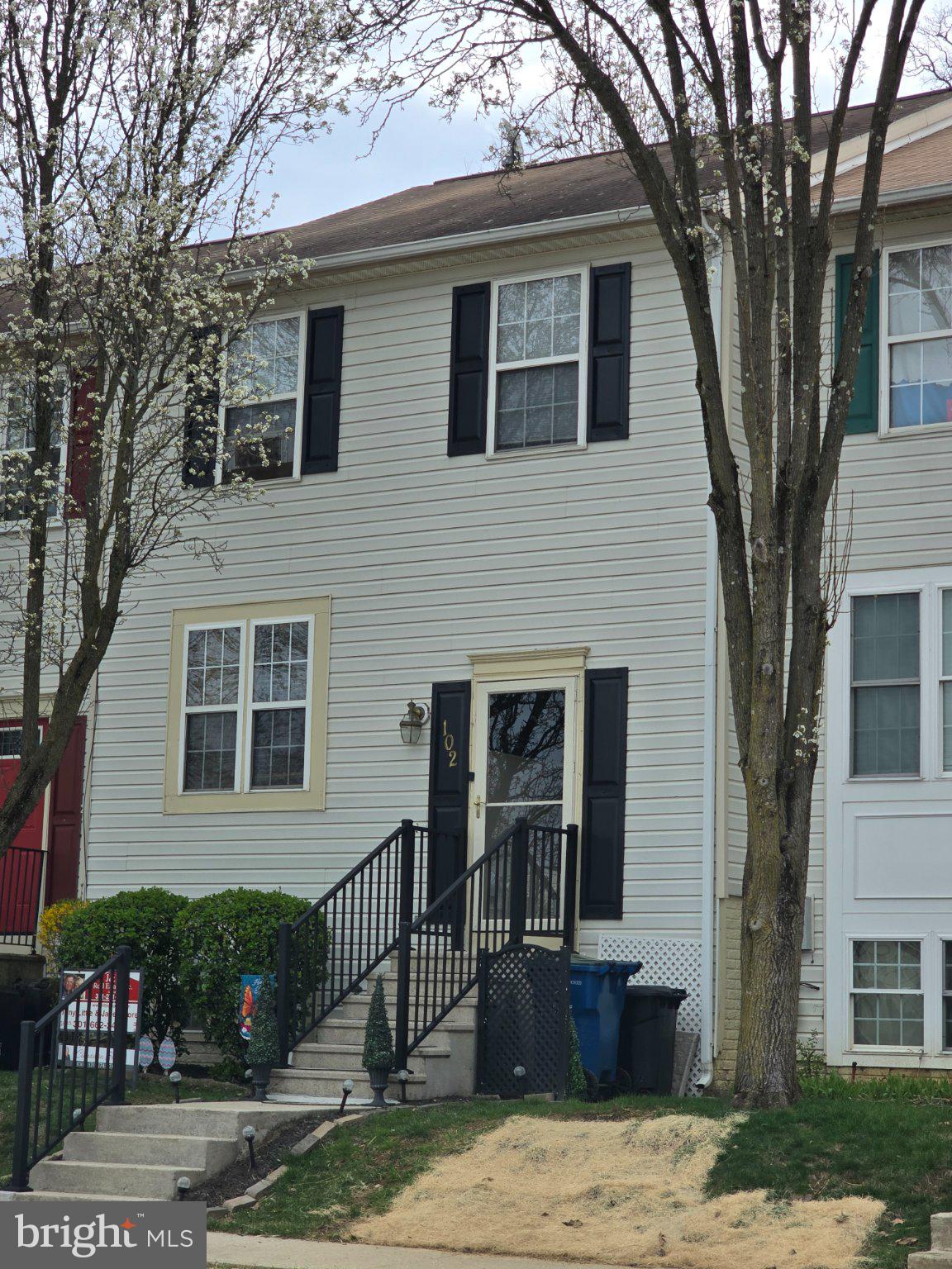 Charming townhouse with inviting entry.