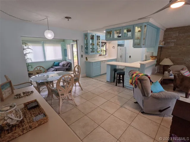 a spacious bedroom with a bed and window