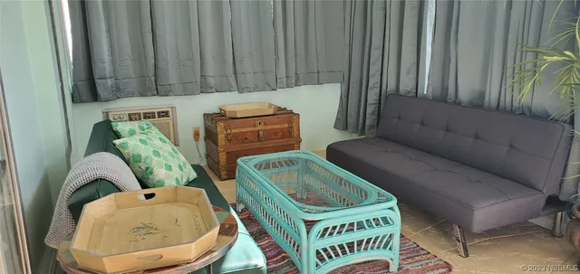 a view of balcony with furniture