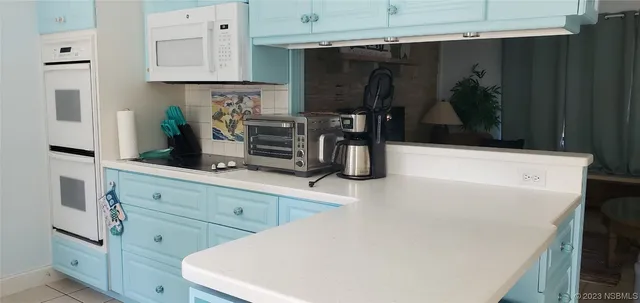 a view of a table and chairs