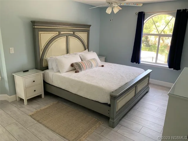a kitchen with granite countertop a sink stove and cabinets