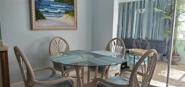 a bathroom with a tub a toilet and a shower