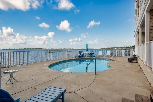 a view of a car park in front of house