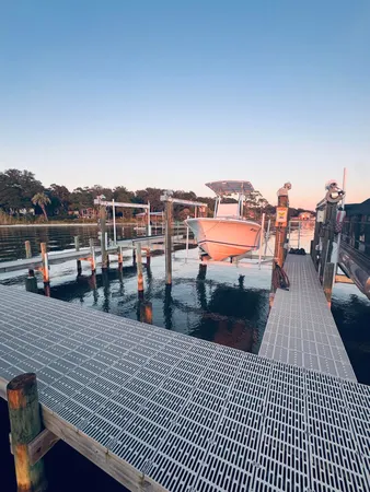 a view of balcony with racks and wooden floor