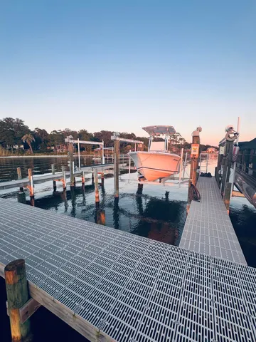 a view of balcony with racks and wooden floor