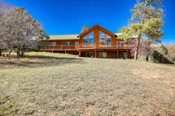 a view of a back yard of the house