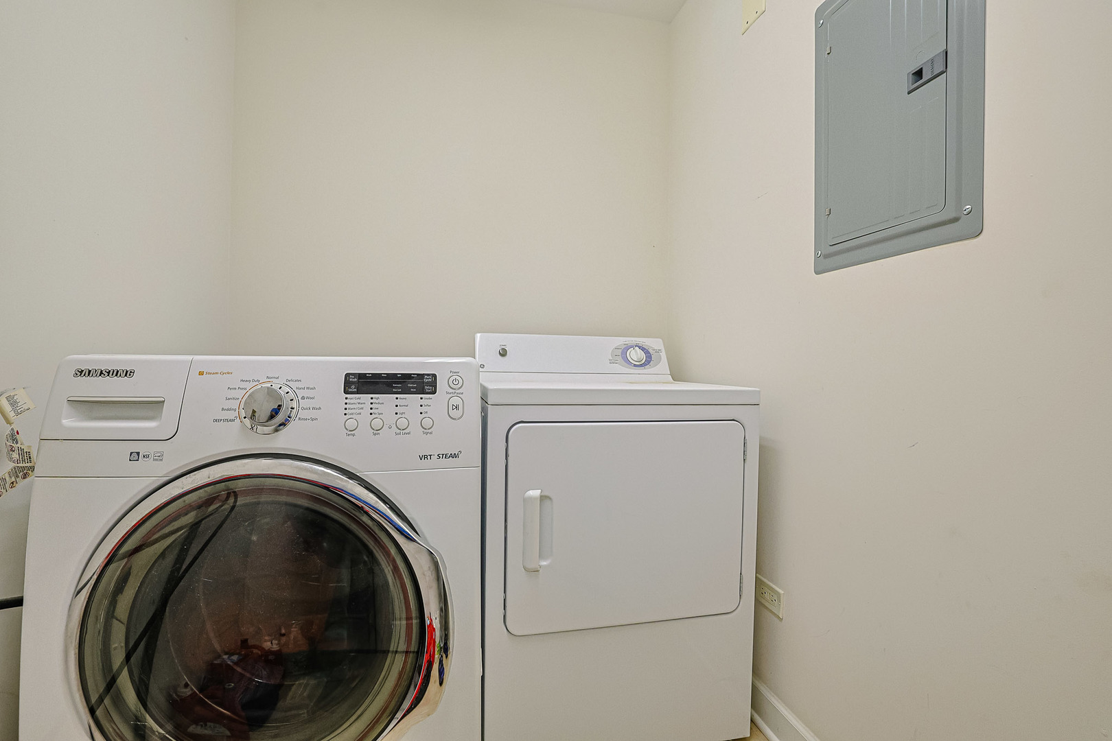 8300 Callie Avenue, Unit 311 Morton Grove, IL 60053 - Photo 18 of 21 a utility room with dryer and washer