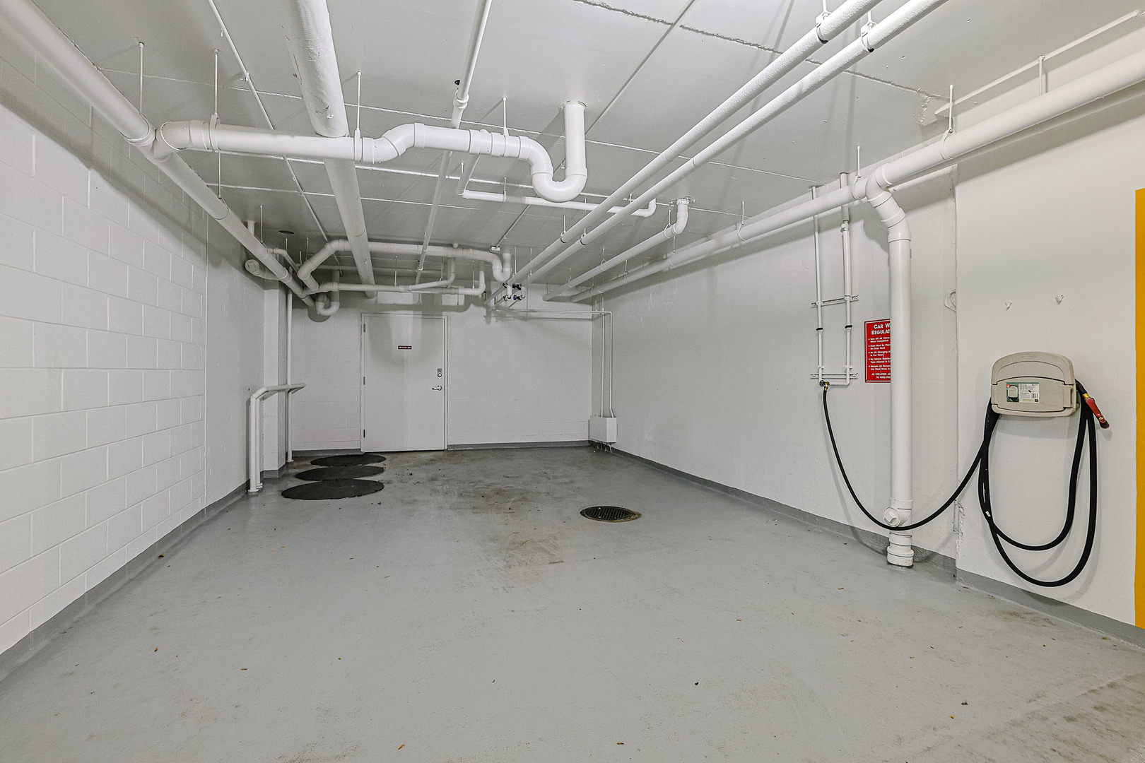 8300 Callie Avenue, Unit 311 Morton Grove, IL 60053 - Photo 21 of 21 a view of a room with racks on the wall