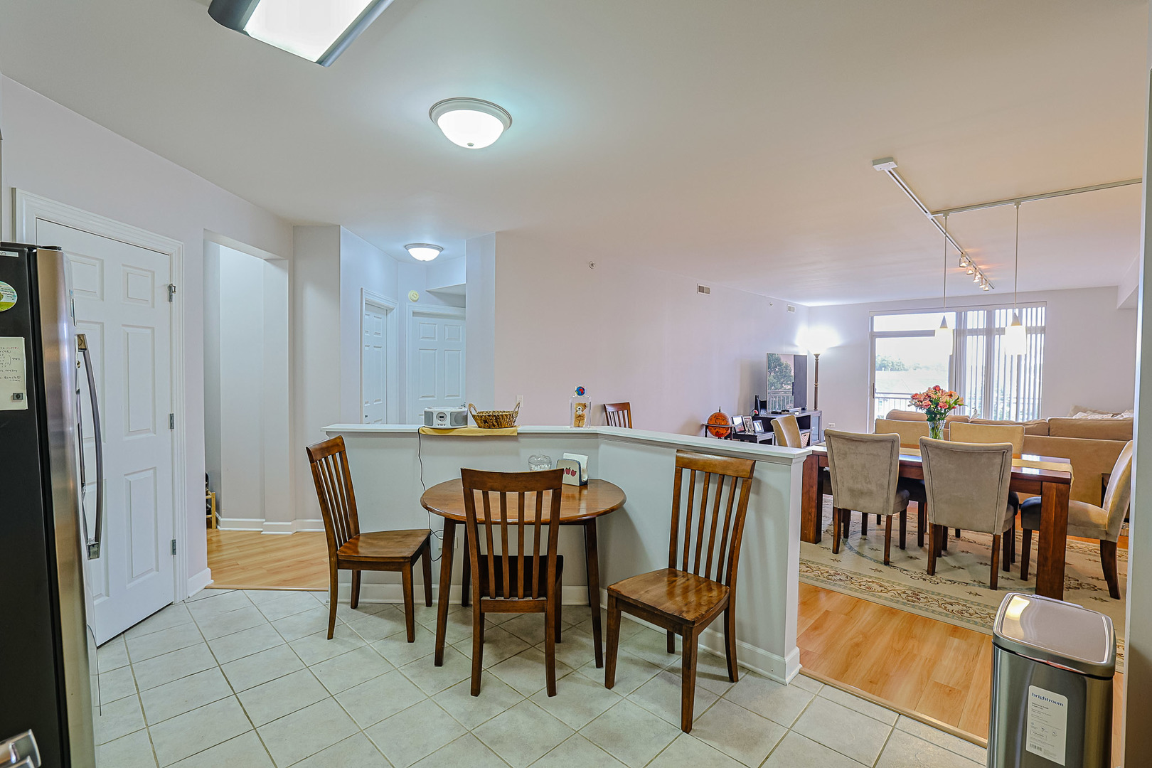 8300 Callie Avenue, Unit 311 Morton Grove, IL 60053 - Photo 10 of 21 a view of a dining area with furniture