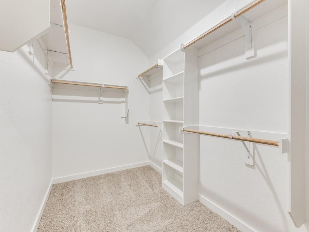 15224 Supreme Street Aledo, TX 76008 - Photo 19 of 25 a view of walk in closet with empty racks