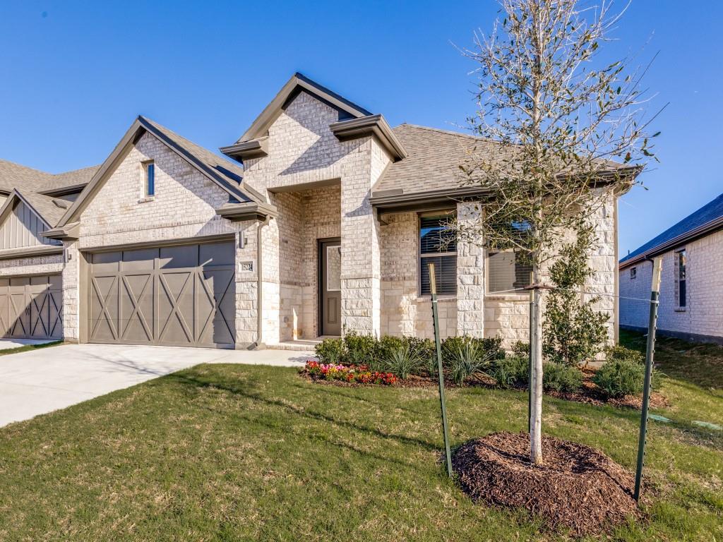 15224 Supreme Street Aledo, TX 76008 - Photo 2 of 25 a front view of a house with a yard