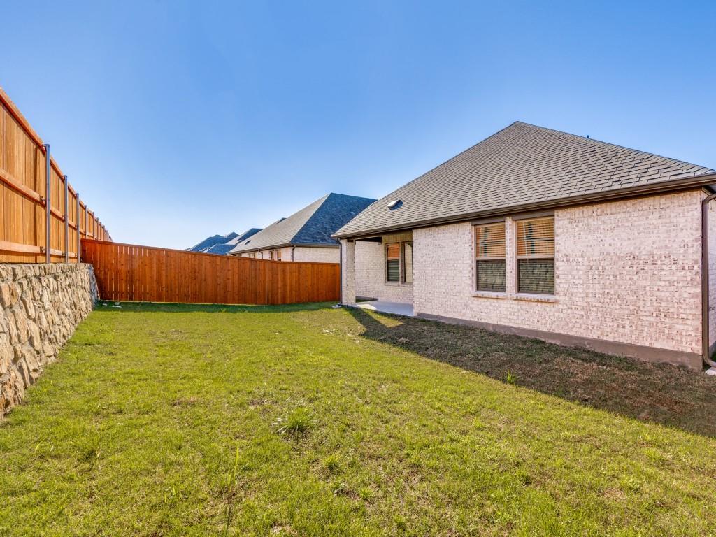 15224 Supreme Street Aledo, TX 76008 - Photo 24 of 25 a view of a house with a yard