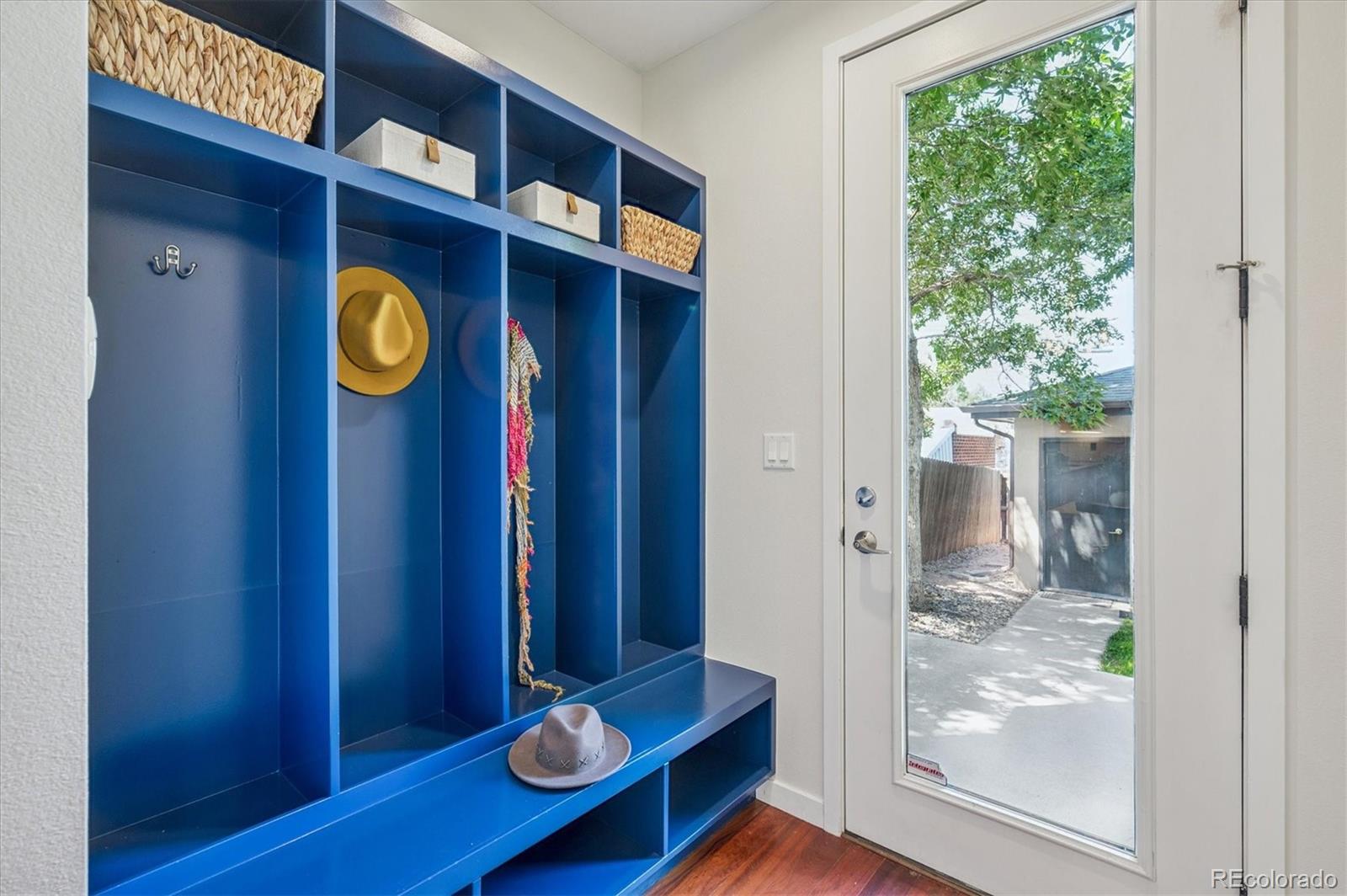 2157 South Logan Street Denver, CO 80210 - Photo 11 of 33 a view of an entryway with wooden floor