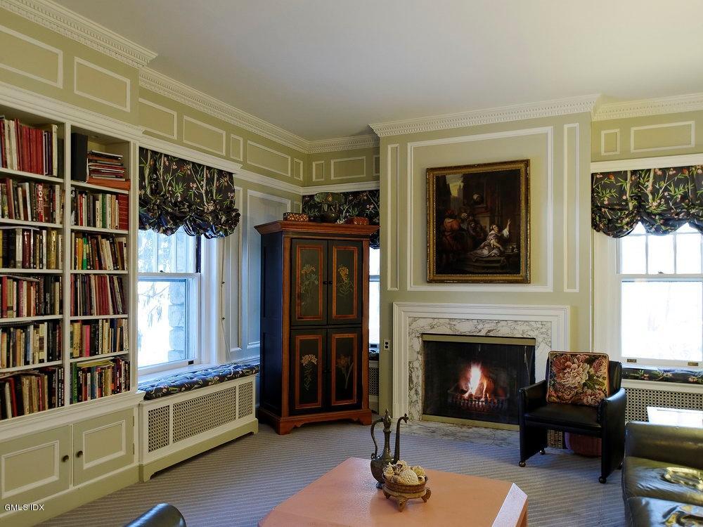 105 Dingletown Road Greenwich, CT 06830 - Photo 11 of 65 a living room with furniture a window and a fireplace
