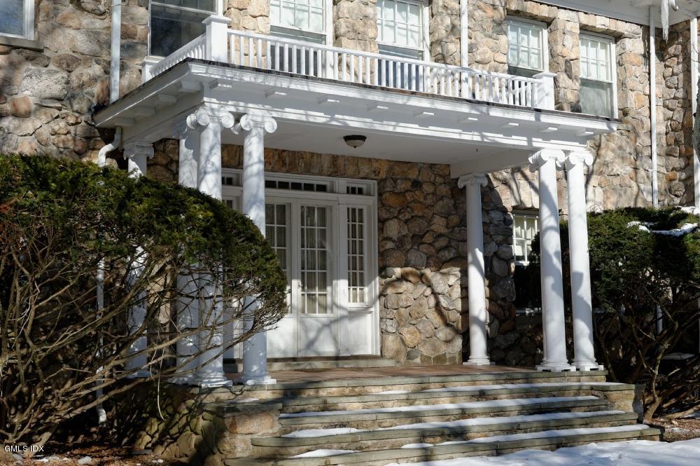 105 Dingletown Road Greenwich, CT 06830 - Photo 31 of 65 a view of a building with a tree