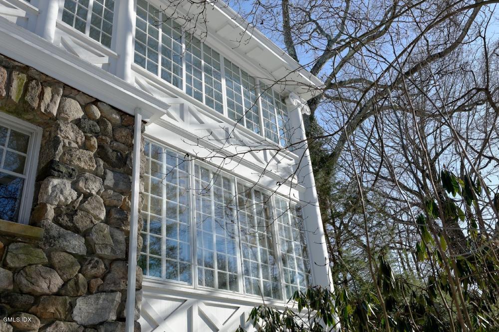 105 Dingletown Road Greenwich, CT 06830 - Photo 33 of 65 a view of a building with a tree